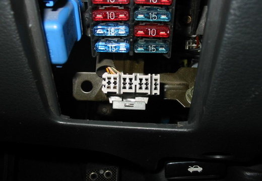 the consult connector plug (connect the top-right-2 pins for engine check mode)
