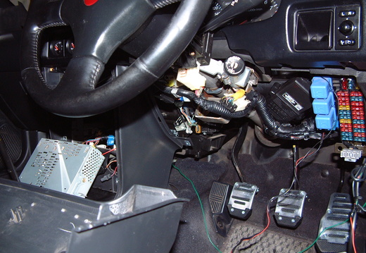 You can get to it with only removing the small footwell panel (other panels removed for photo)