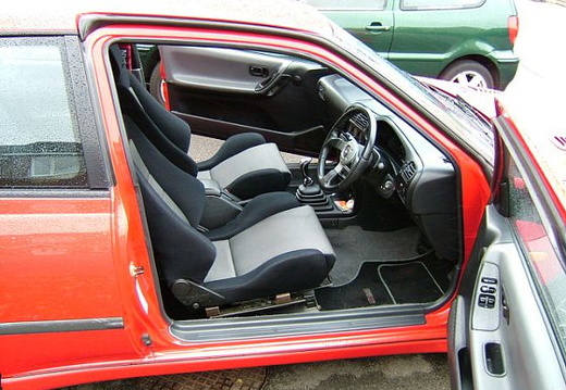 plastic door trim and rubber gearstick boot (note: seats, steering wheel, matts and shifter shown are non-original)